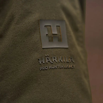Olive green fabric with Härkila Pro Hunter GTX Legacy logo on jacket