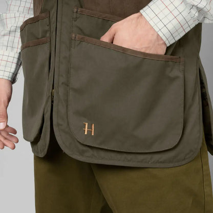 Olive green Härkila Rannoch HSP shooting waistcoat with brown trim for hunting fans