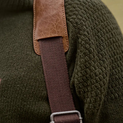 Olive green Härkila Vincent Merino Half Zip Pullover with brown leather and canvas strap