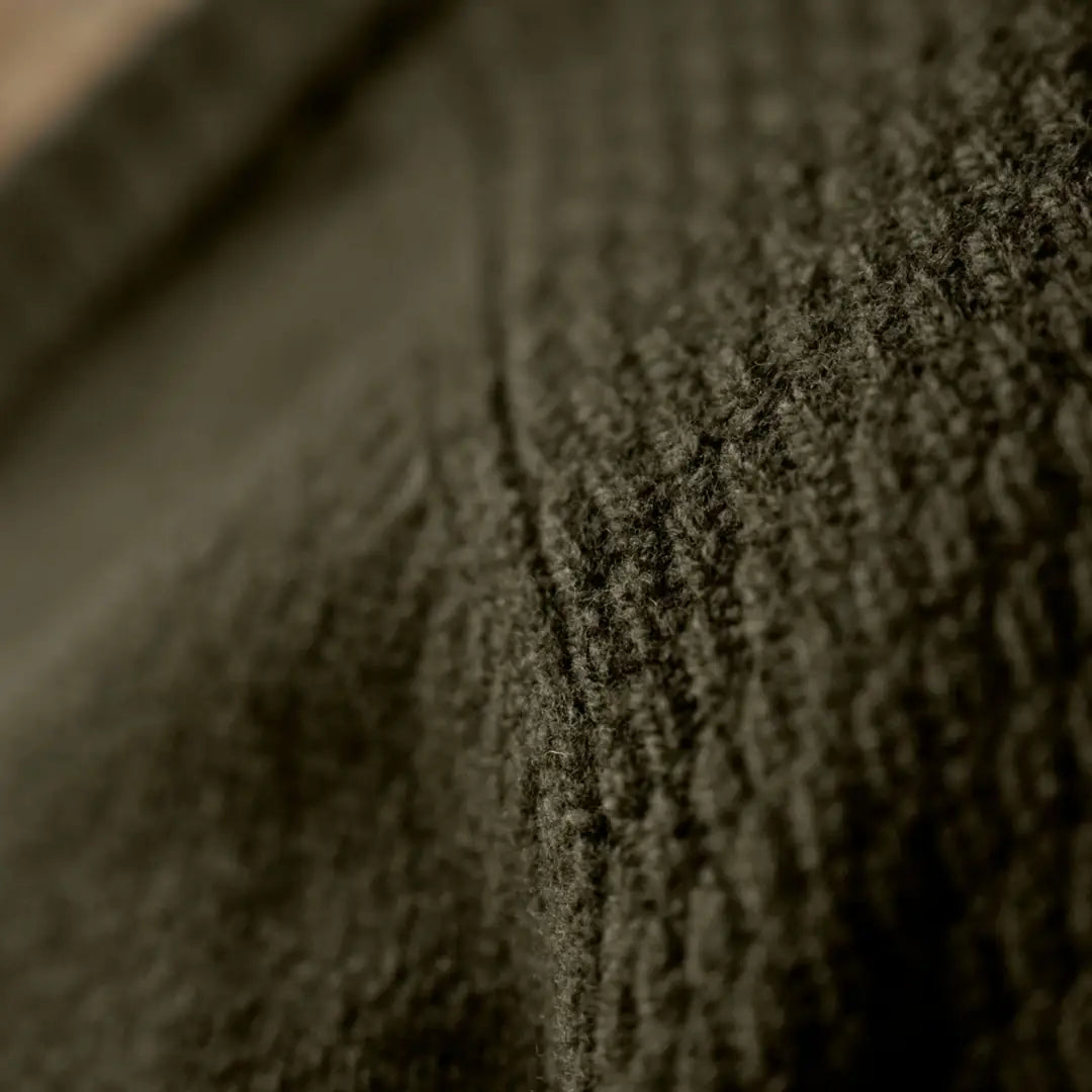 Textured dark green knit fabric from the Härkila Vincent Merino V-Neck Pullover