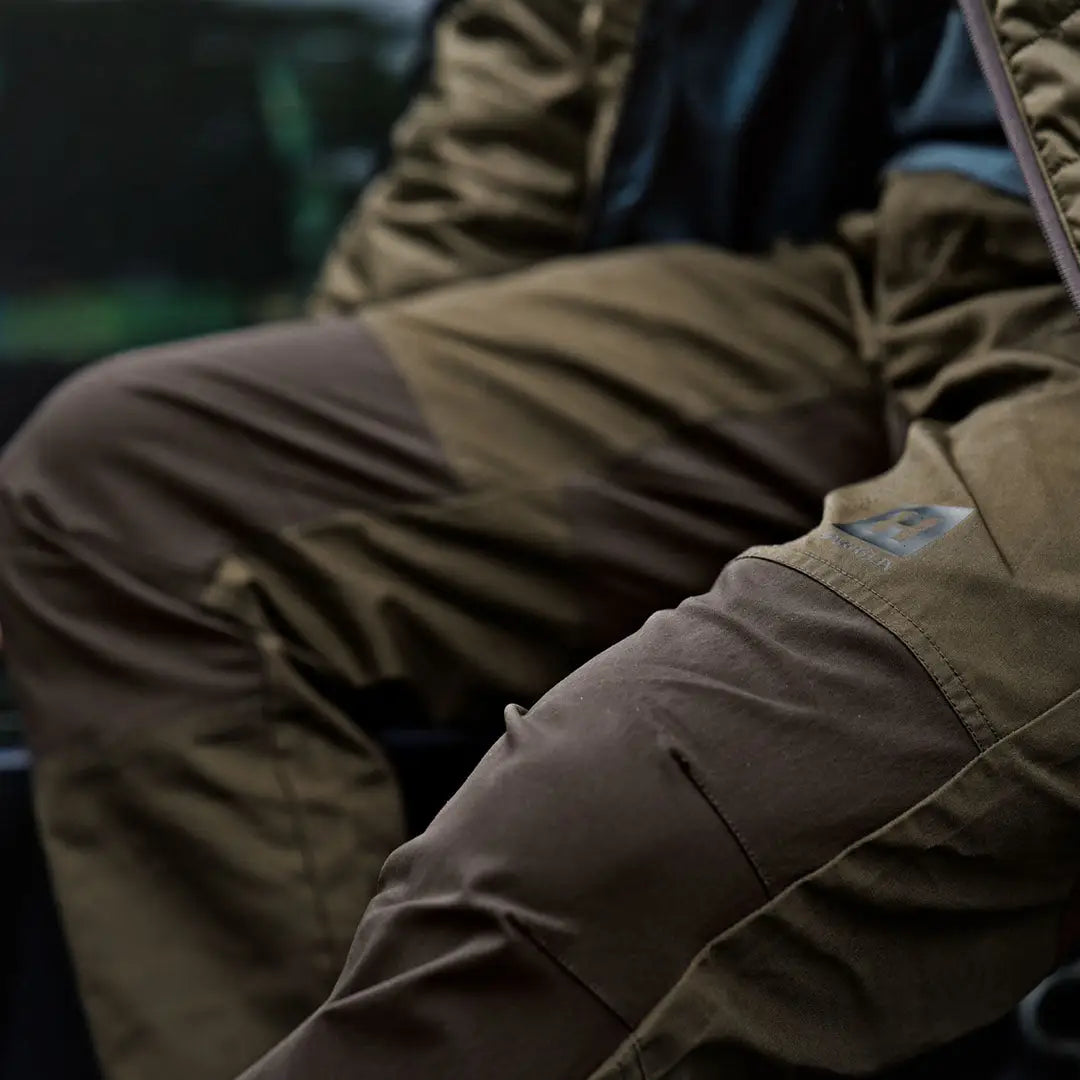 Olive-green Harkila Fjell Trousers perfect for country clothing and hunting adventures