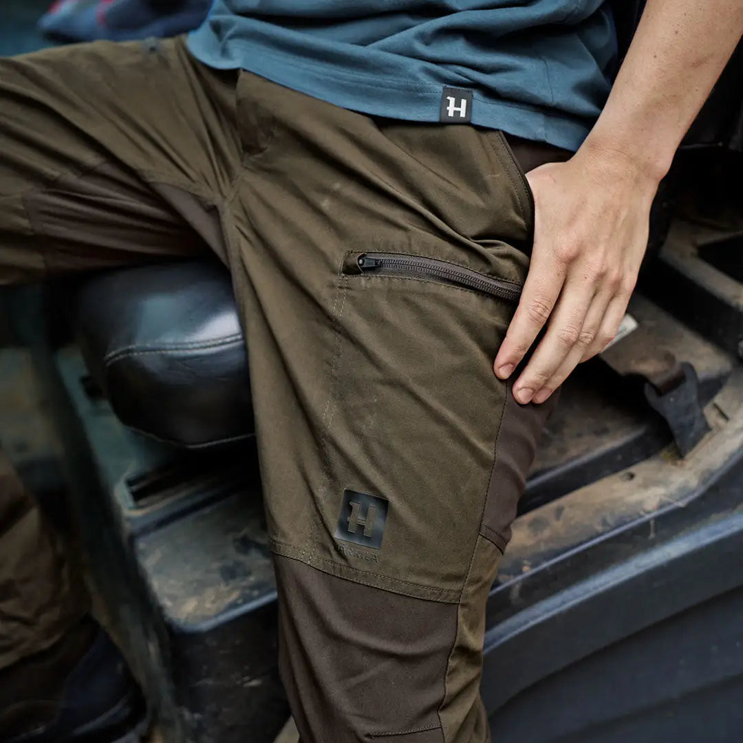 Olive green Harkila Fjell Trousers perfect for country clothing and hunting adventures