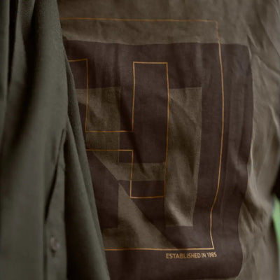 Brown Harkila H-Logo Short Sleeve T-Shirt with geometric design for casual wear