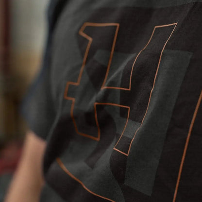 Black short sleeve T-shirt with copper Harkila H-logo for a cool look