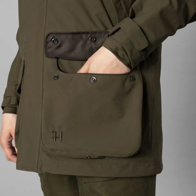 Olive green Harkila Ladies Orton Tech HWS Jacket featuring a standout front pocket