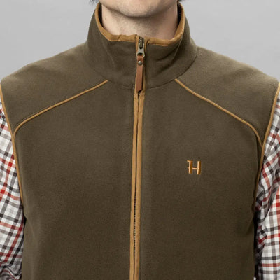 Olive green Harkila Sandhem waistcoat with tan trim, perfect for country clothing and hunting