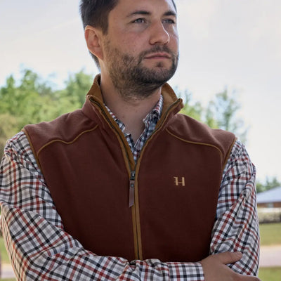 Man in Harkila Sandhem 200 Waistcoat over plaid shirt, stylish country clothing for hunting