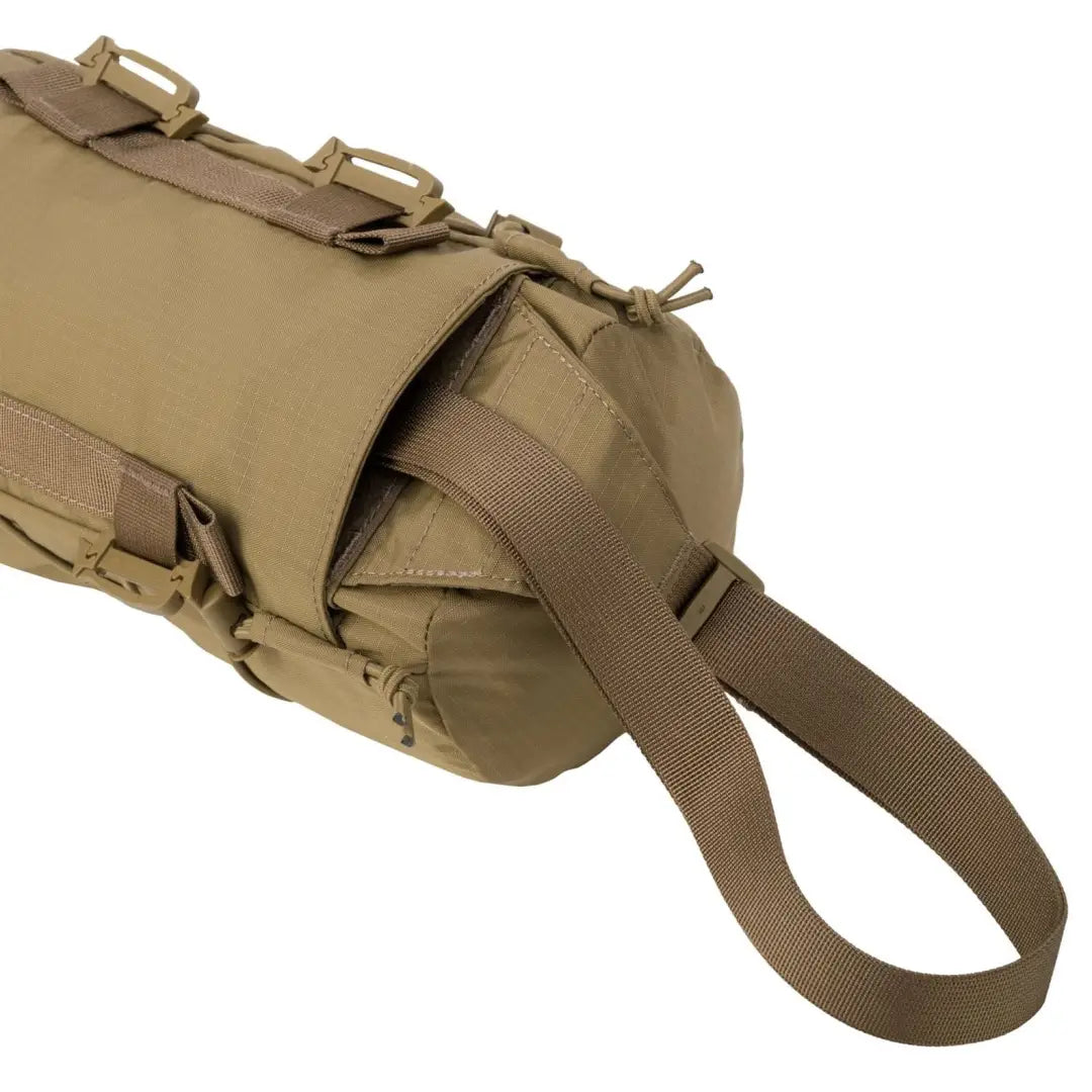 Tactical tan Helikon-Tex Foxhole Bag with adjustable straps for easy access and carry