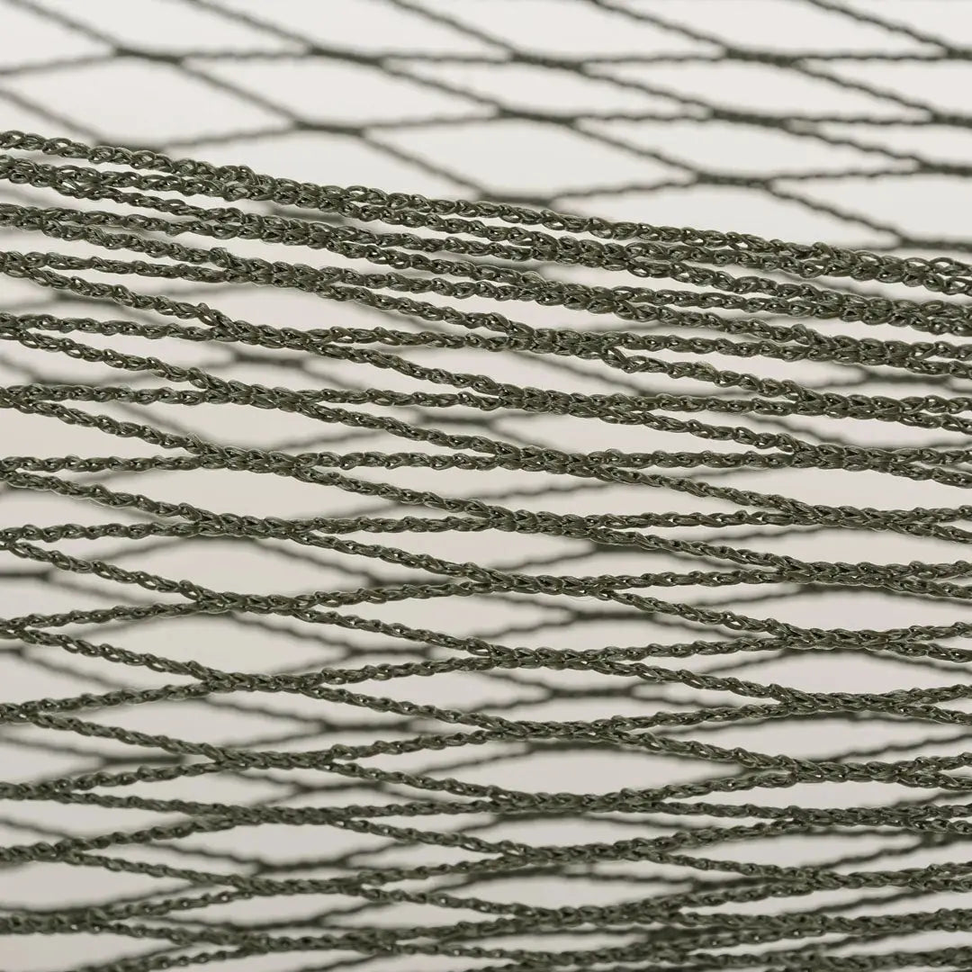 Criss-crossing dark threads in Highlander Gear Store Hammock for outdoor adventures