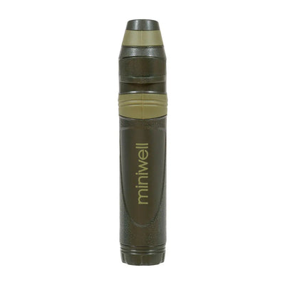 Military-style artillery shell labeled Miniwell for Highlander Straw Water Filter outdoors