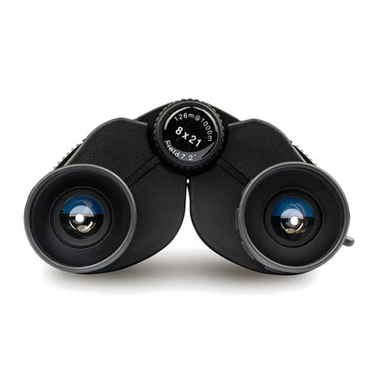 Pair of black Highlander Tarn 8X21 Binoculars with blue-tinted lenses offer outstanding vision
