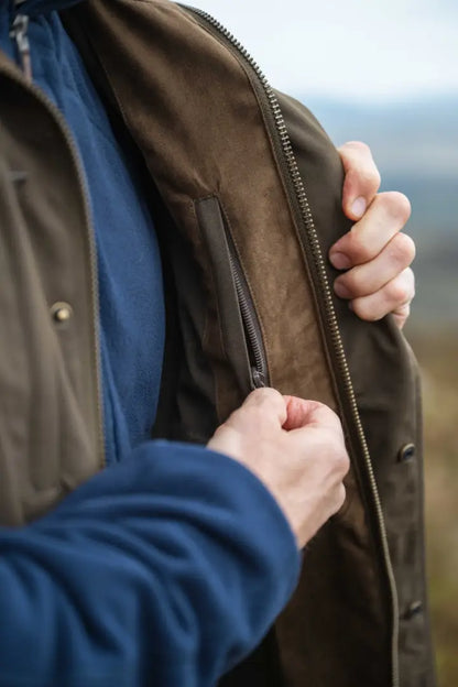 Olive green Hoggs of Fife Ballater waterproof field waistcoat with zipper and button details