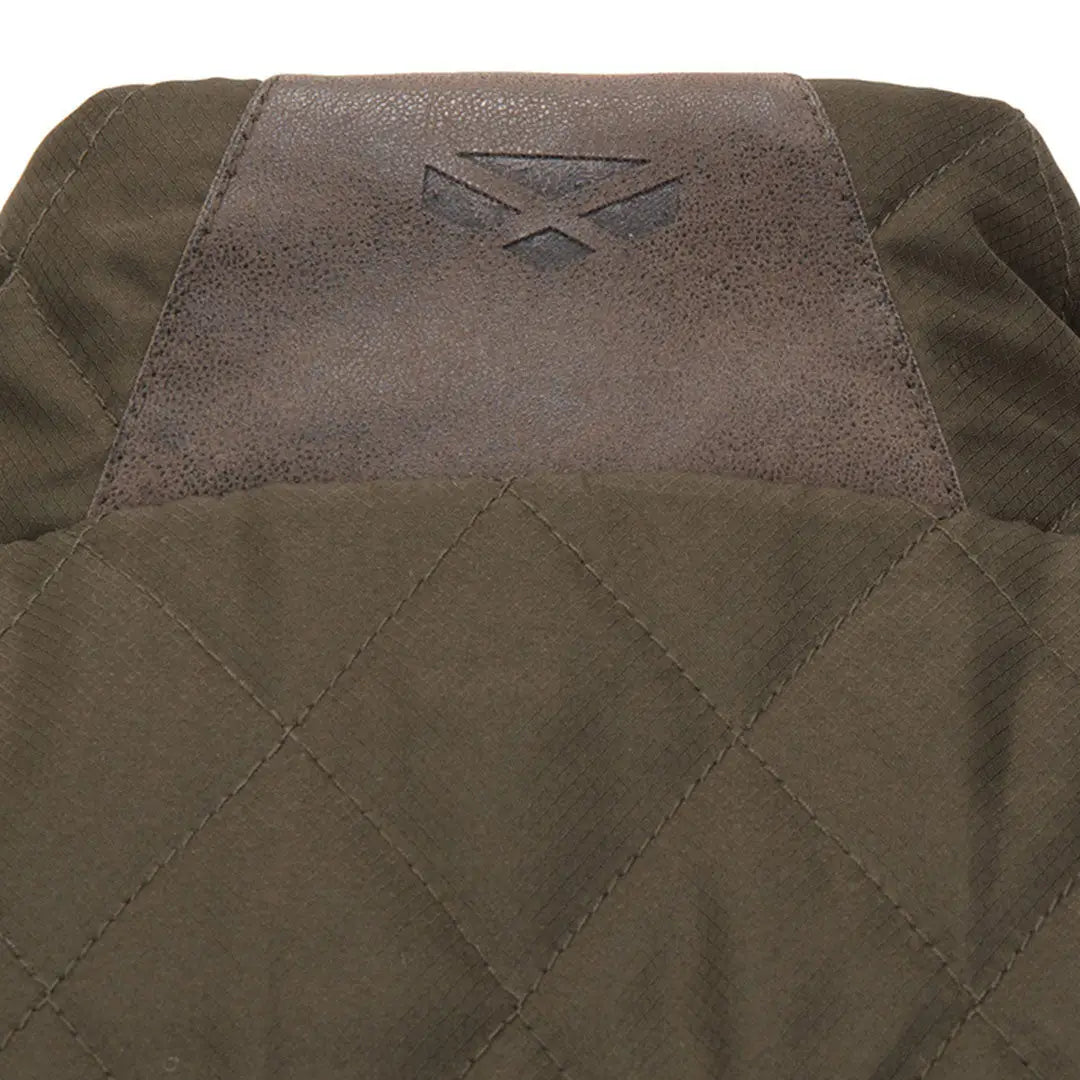 Olive green Lindores Gents quilted gilet with dark brown faux leather shoulder patch