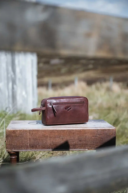 Brown leather Hoggs of Fife Monarch Wash Bag with silver hardware for outdoors and hunting trips