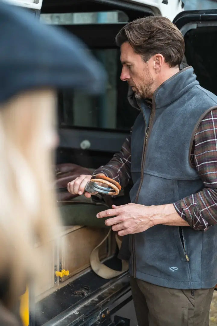 Grey Hoggs of Fife Stenton technical fleece gilet with plaid lining and orange zipper pull