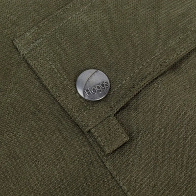 Metal button with Hoggs engraved on olive green fabric of Fife Struther Field Trousers