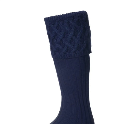 Navy blue cable-knit House of Cheviot Rannoch Socks made from cozy merino wool