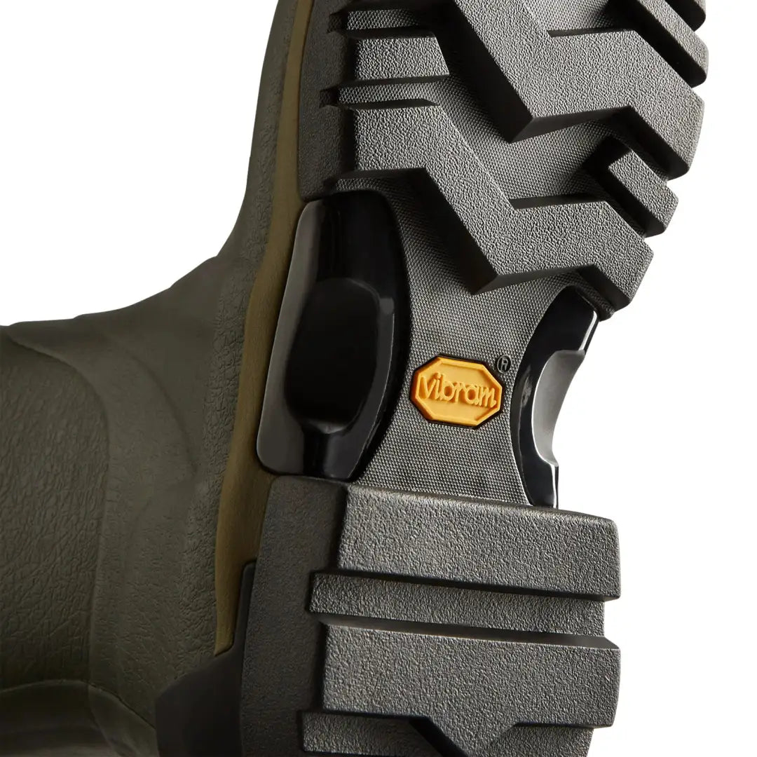 Green boot sole with black tread on Hunter Womens Balmoral Tall Neoprene Wellington Boot for outdoors