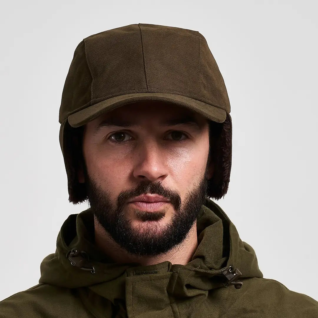 Cozy olive green woolen Jack Pyke Alaska hat with ear flaps