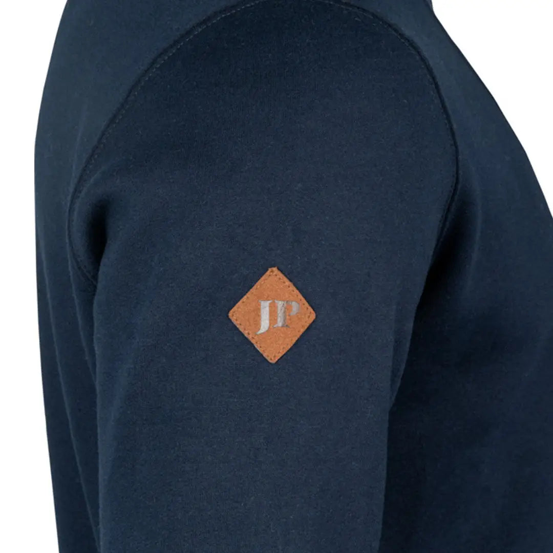 Navy blue Jack Pyke half zip sweatshirt with brown leather jp patch