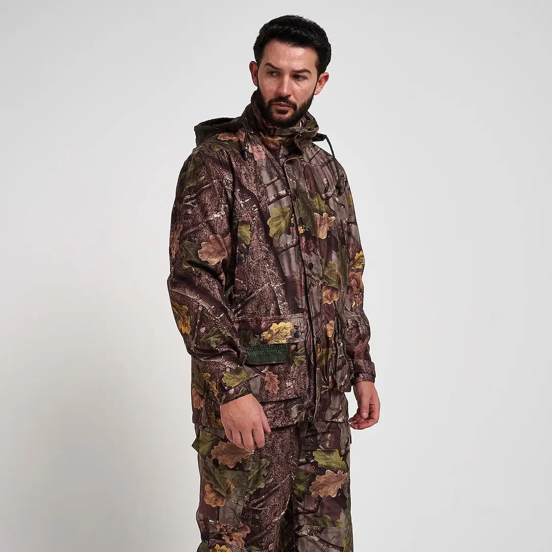 Man in Jack Pyke Hunter jacket with camo leaf patterns