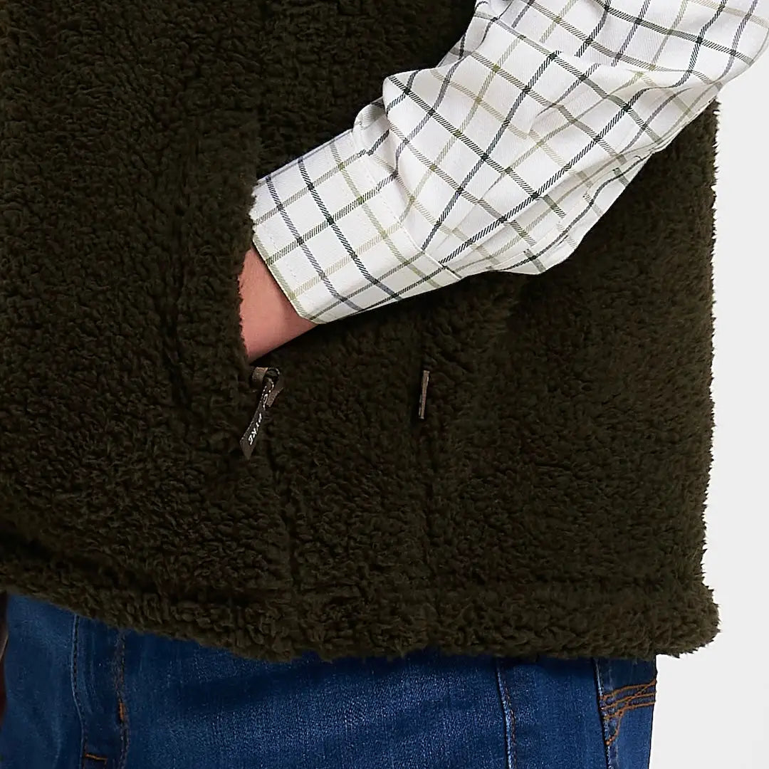 Dark olive green Jack Pyke junior sherpa fleece gilet with plush texture and zipper