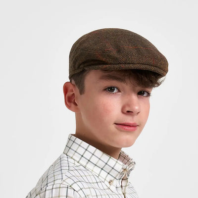 Jack Pyke junior wool blend tweed flat cap in brown herringbone with red accents