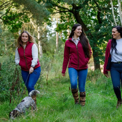 Three women in a forest wearing Jack Pyke Ladies Countryman Fleece Gilet