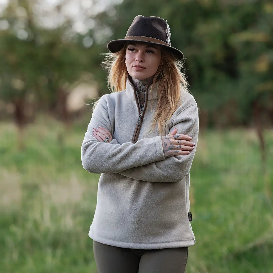 Jack Pyke Ladies Countryman beige fleece pullover with brown accents and black fedora