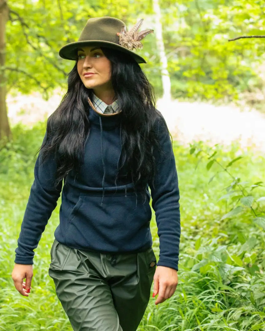 Stylish woman in Jack Pyke Ladies Fleece Hoodie ready for outdoor adventures