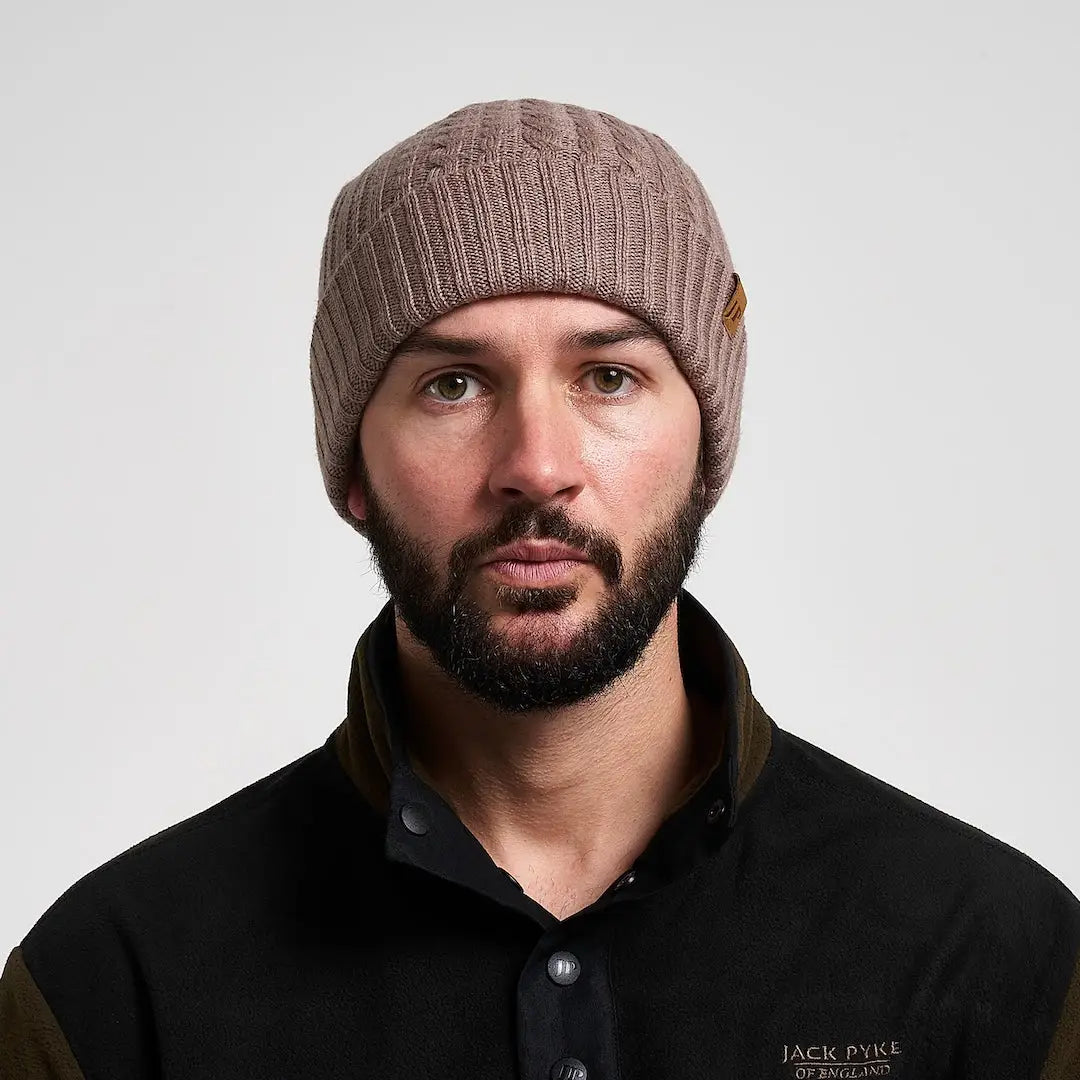 Taupe ribbed Jack Pyke merino wool beanie with leather tag
