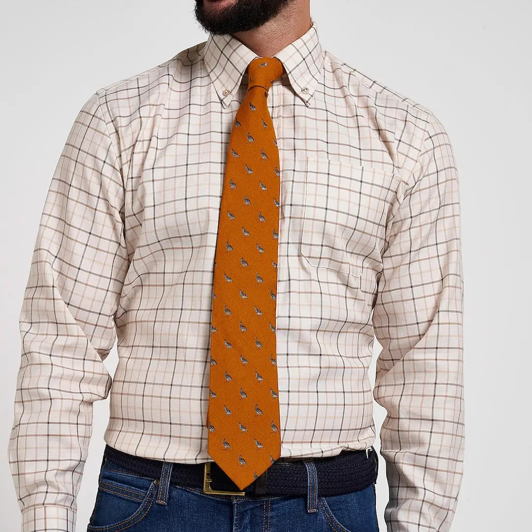 Vibrant Jack Pyke Partridge silk tie with orange bird pattern