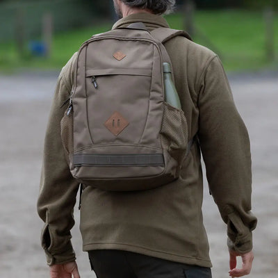 Khaki backpack with water bottle next to Jack Pyke Polar Fleece Shirt