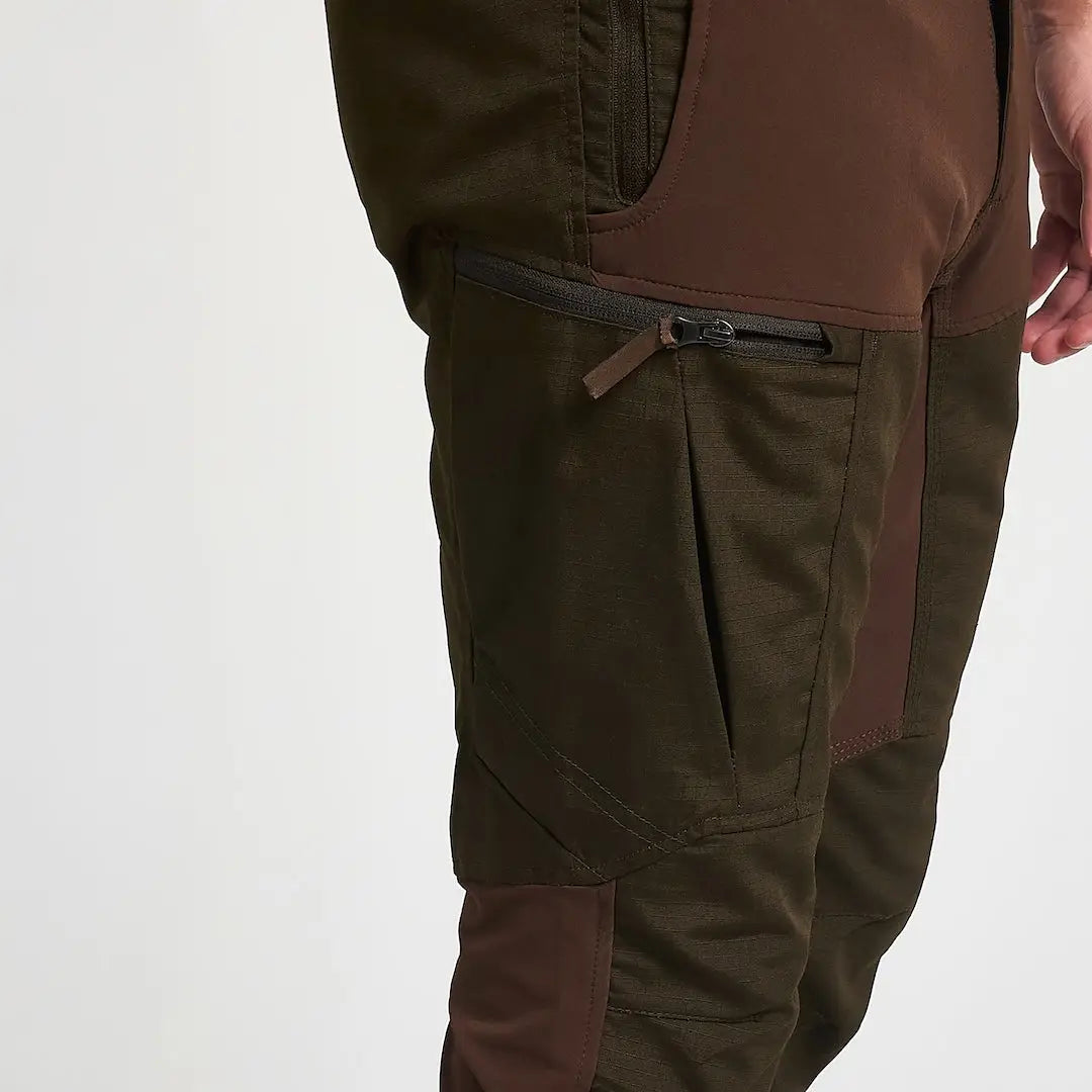 Jack Pyke technical hybrid trousers in dark olive with reinforced stitching