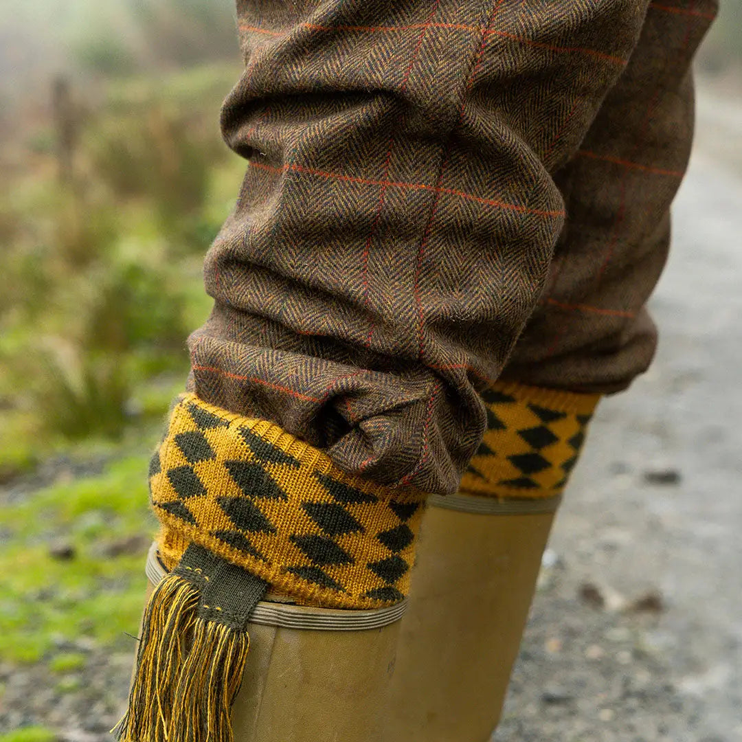 Jack Pyke yellow black diamond knitted gaiter on tweed breeks