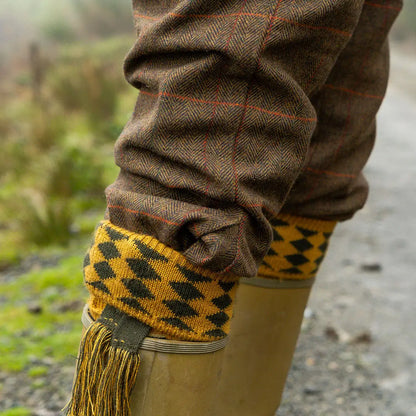Jack Pyke yellow black diamond knitted gaiter on tweed breeks