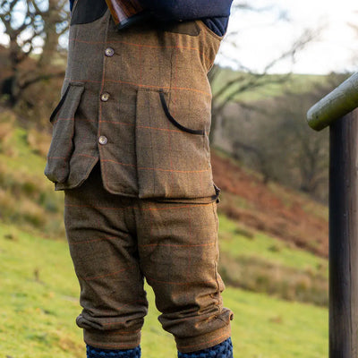 Jack Pyke brown tweed shooting vest with orange check and black trim
