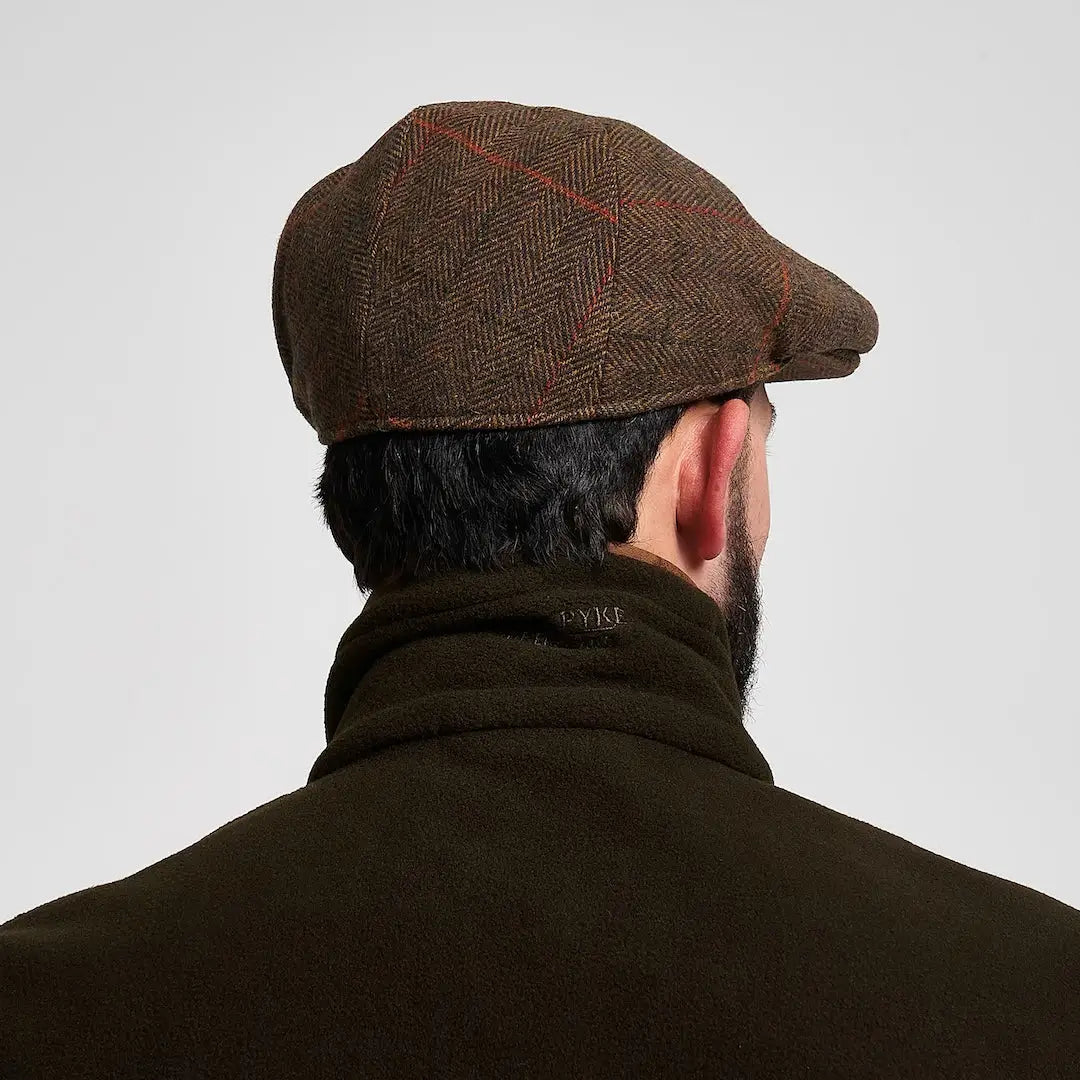 Jack Pyke wool blend flat cap in brown herringbone tweed with red check
