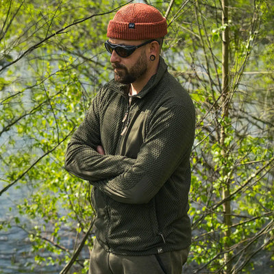 Man in olive jacket and orange beanie wearing Jack Pyke Z Fleece Pullover