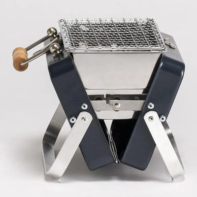 Portable Kenluck Mini Grill perfect for BBQs on the go and outdoor cooking adventures