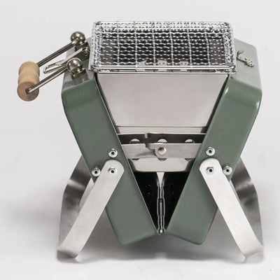 Portable Kenluck Mini Grill perfect for BBQs and outdoor cooking adventures