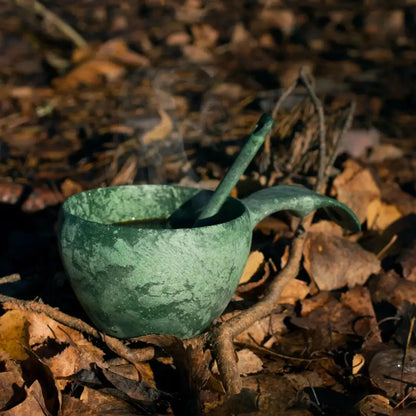 Green wooden Kupilka Classic Cup with spoon, perfect for country clothing and outdoors adventures