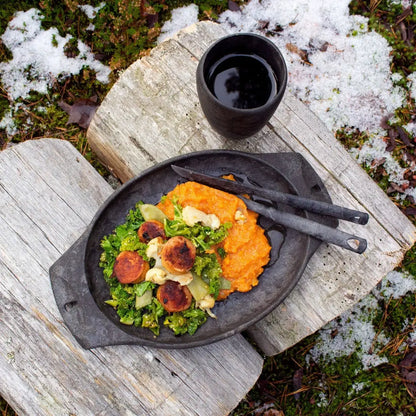Rustic meal presentation with a Kupilka Cup, perfect for enjoying country clothing vibes