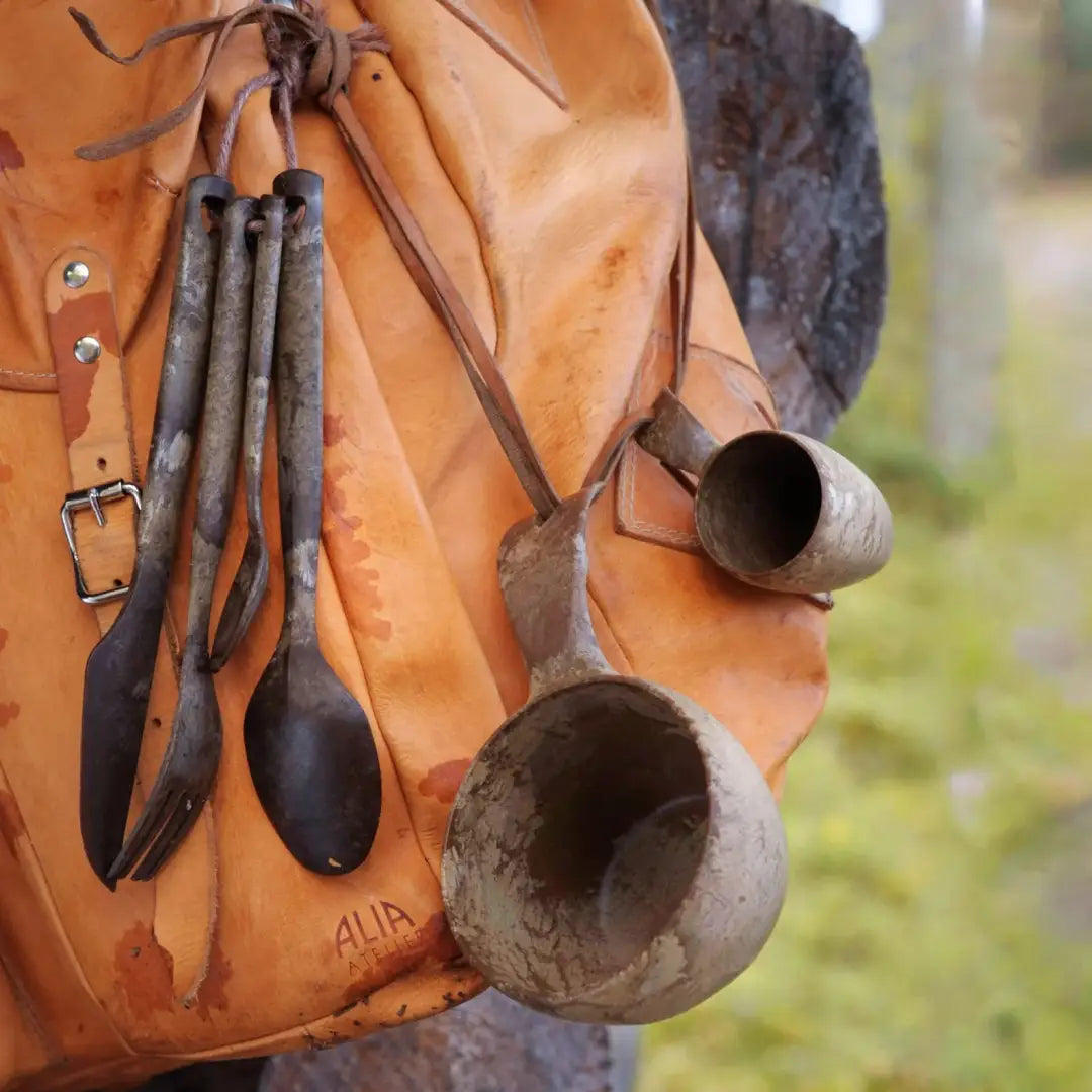 Leather backpack with rustic Kupilka Cutlery Set for country clothing and outdoor adventures