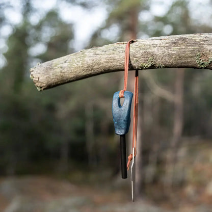 Blue handled fire starter with striker from Kupilka Firesteel for outdoor country clothing