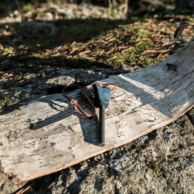 Kupilka Firesteel fire starter with leather lanyard, perfect for outdoor adventures and country clothing