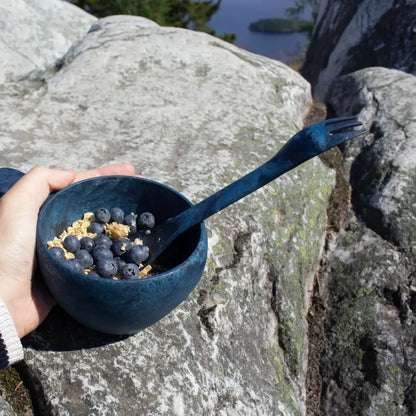 Blue bowl with blueberries and a Kupilka Spork, perfect for outdoors adventures