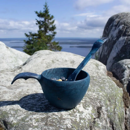 Blue cup with spork, perfect for outdoor adventures and country clothing vibes