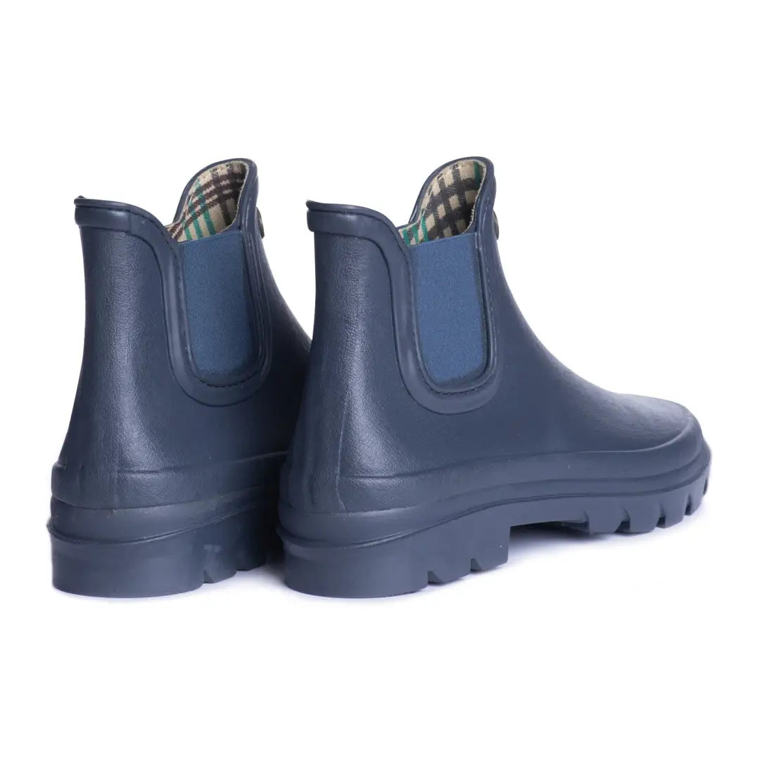 Pair of stylish iris blue Chelsea boots with short Chelsea height for everyday wear