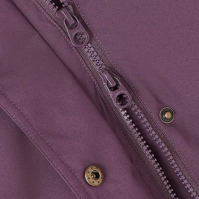 Close-up of Lighthouse Imogen Ladies Coat with purple fabric, two-way zipper, brass snaps